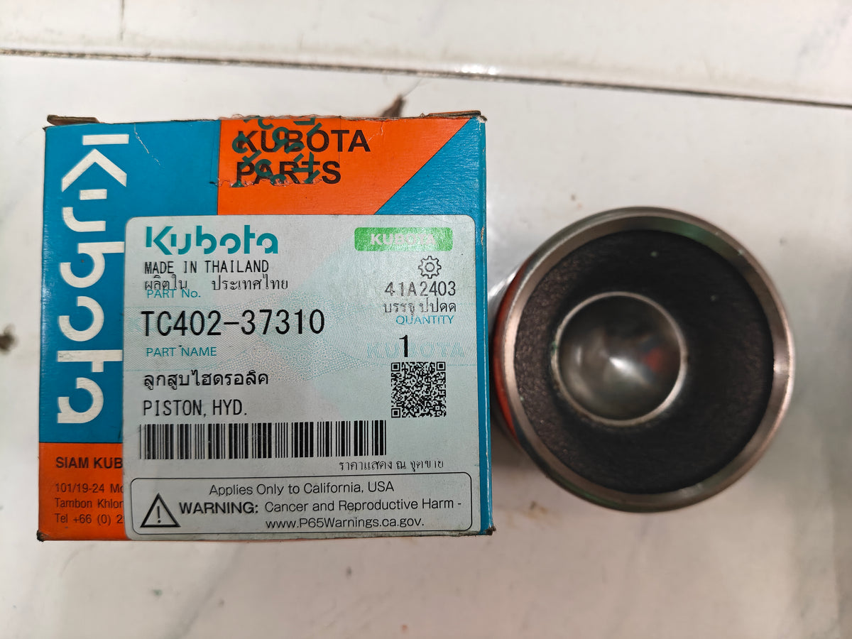 TC402-37310 PISTON, HYDRAULIC. (L-4018)