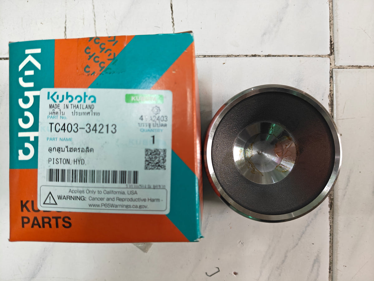 TC403-34213 PISTON, HYDRAULIC. (L-5018)